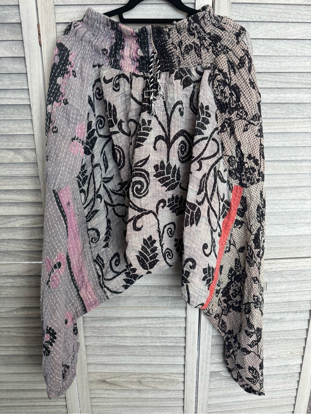 Everyday Harems in gray, lavender, and black with a pop of coral.